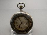a silver pocket watch with roman numerals on it