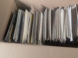 a cardboard box with a bunch of files in it