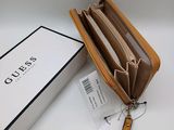 the purse is open on the table next to the box