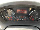 a close up of a car dashboard with various gauges and numbers