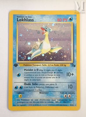 a close up of a pokemon card on a wall