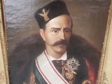 portrait d'un homme en uniforme militaire dans un cadre doré