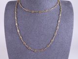 a gold chain necklace on a mannequin mannequin mannequin mannequin mannequin mannequin mannequin mannequin manne