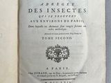 un livre ouvert avec l'image d'un oiseau dessus