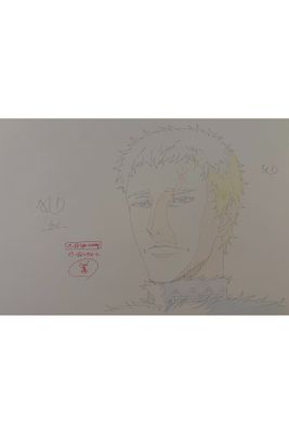 drawing of a man ' s face on a piece of paper
