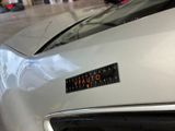 a sticker on the hood of a sports car