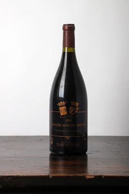 a bottle of wine that is sitting on a table