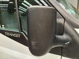 an image of a side view mirror of a transit vehicle