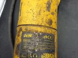 a close up of a yellow pipe with a wren on it