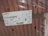 a label on the back of a suitcase that is wrapped in plastic