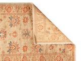 an old rug with a floral design on it