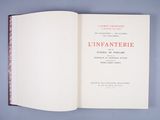 an open book on a table with a blue background