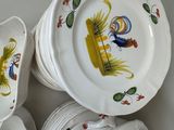 several plates and bowls are stacked on top of each other