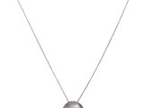a necklace with a silver disc on a silver chain