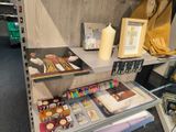 a shelf with various items on it in a store