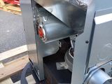 a machine that is sitting on top of a pallet