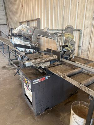 an image of a machine that is working on a piece of wood