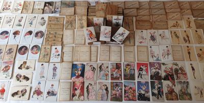 a lot of cards on the floor with pictures on them