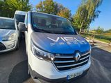 a van that is parked next to another van