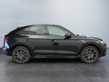 the new audi q4 suv is parked in a garage