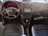 a picture of a car dashboard with a steering wheel and dashboard lights