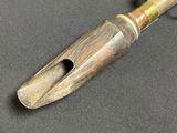 a pen that is sitting on top of a table