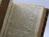 an open book that is sitting on top of a table