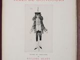 an old book with a drawing of a man in a hat and coat