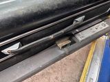 a close up of a car door handle with a key in it