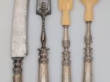 five different types of silverware on a table