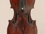 a close up of a violin on a white background
