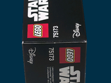 a box of lego star wars items sitting on a table