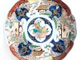 a plate with a design on it on a white surface