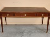 a small desk with two drawers on top of it