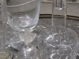 a table with a lot of glass items on it