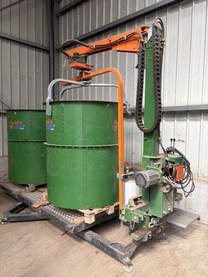 a machine that is sitting on a pallet in a warehouse