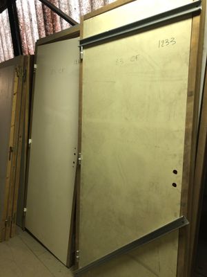a room that has a bunch of doors in it