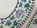 an image of a close up of a piece of cloth with flowers on it