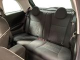 the back seats of a car are black in color