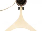 a camera that is on a stand on a white surface
