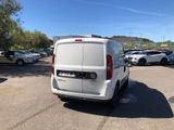 a white van that is parked in a parking lot