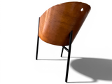 a chair that is sitting on a white surface