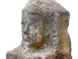 an image of a stone statue of a head on a white background