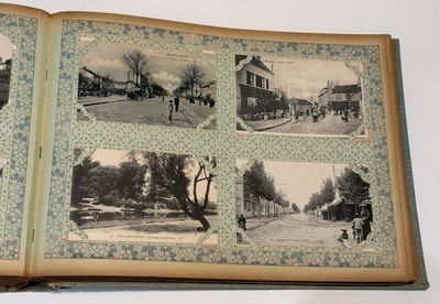 an open book with pictures of people and buildings on it
