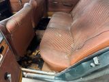 an old car that has been cleaned and is in the process of being restored