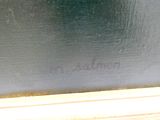 un gros plan sur un tableau représentant un chat sur le rebord d'une fenêtre