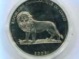 un gros plan d'une pièce de monnaie sur laquelle figure un lion