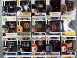 a lot of funko pop vinyl figures on display