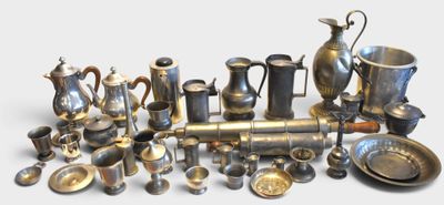 a lot of silver items that are on a table