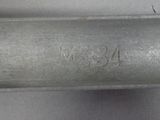 an image of a close up of a metal pipe on a table